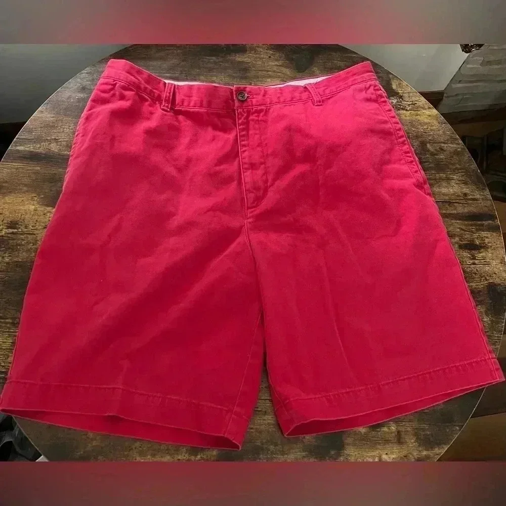 IZOD | men’s red flat front shorts. Size: 38​